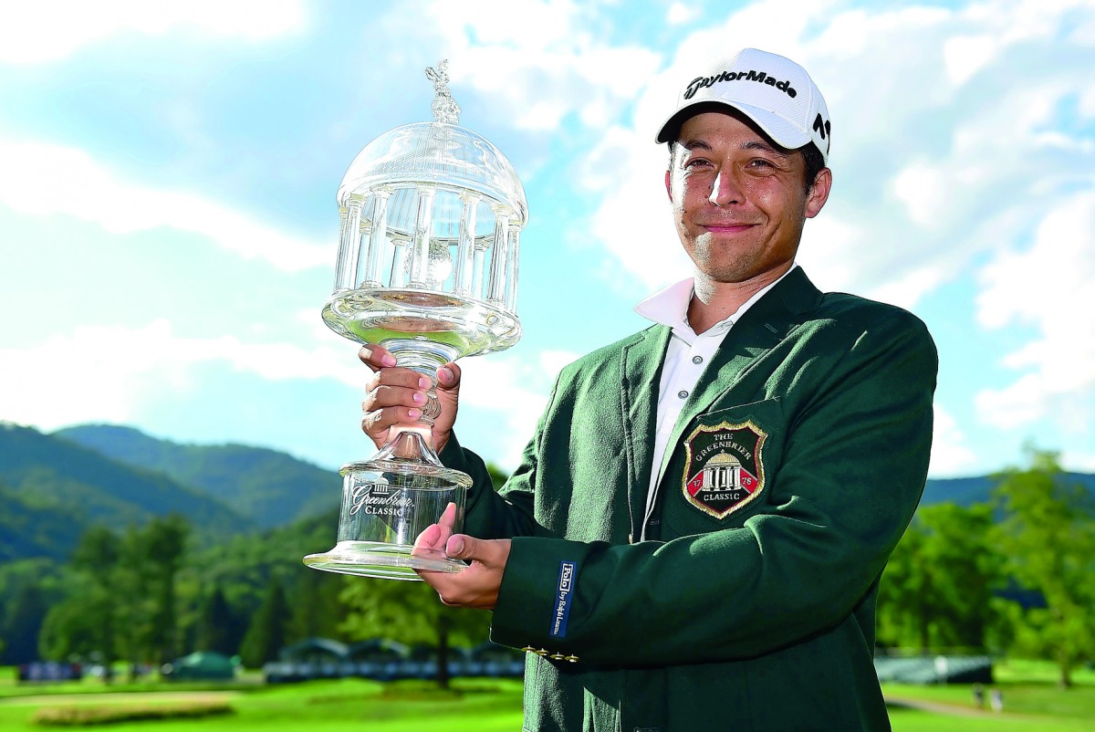 Xander Schauffele poses with the trophy after the final round of The Greenbrier Classic held at the Old White TPC in White Sulphur Springs, West Virginia on Sunday.
