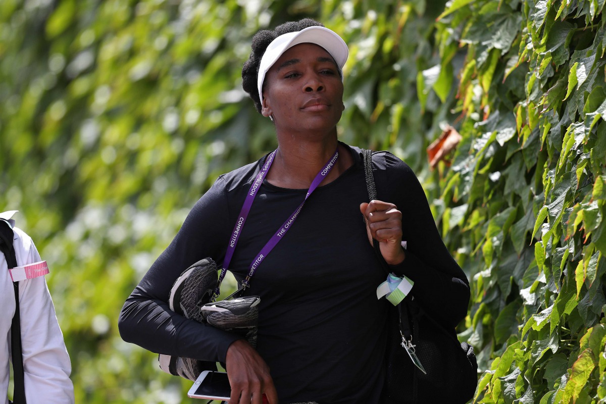 US player Venus Williams arrives to attend a practice session on the eleventh day of the 2017 Wimbledon Championships at The All England Lawn Tennis Club in Wimbledon, southwest London, on July 14, 2017, on the eve of her women's final match against Spain