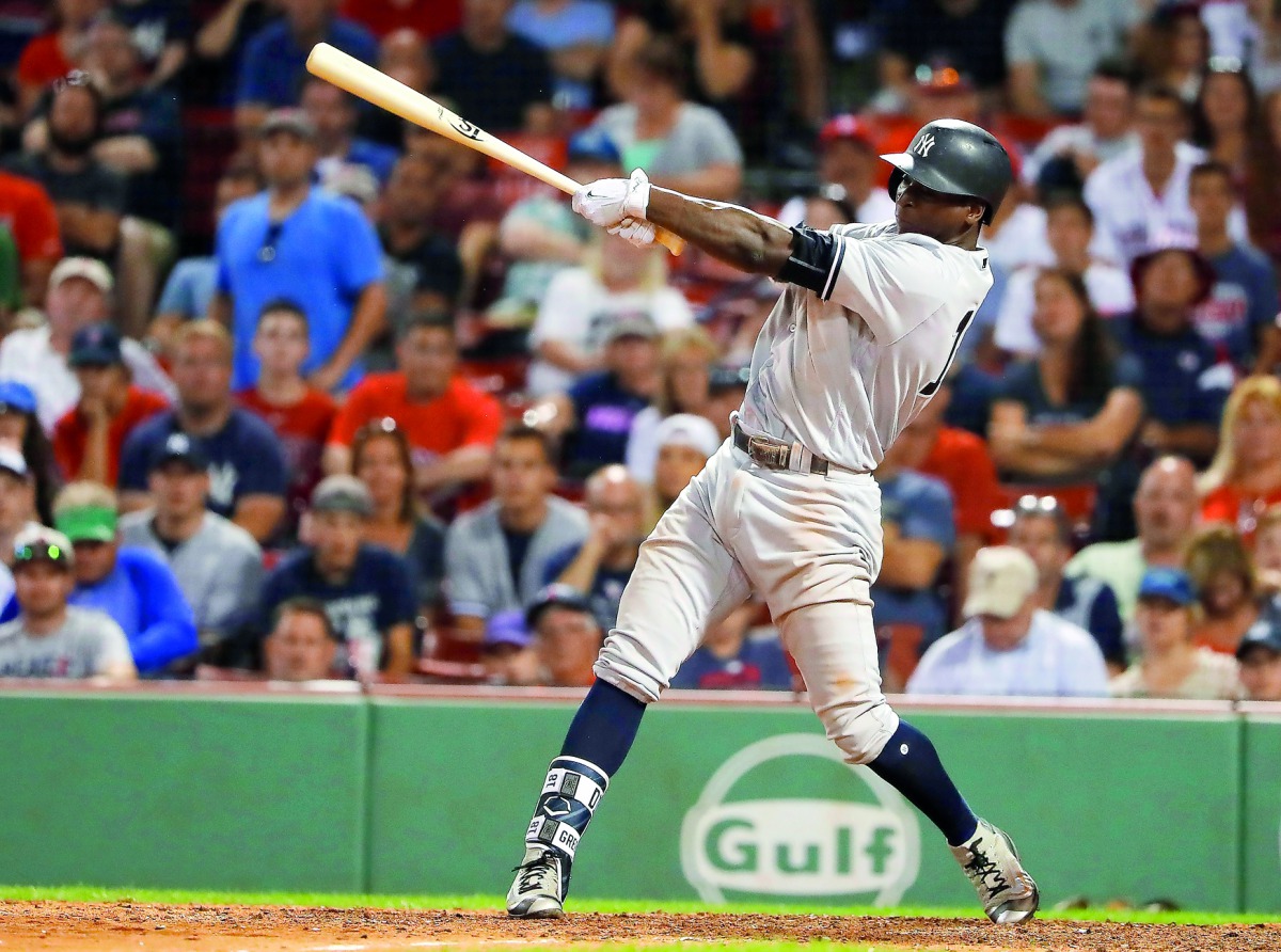 New York Yankees shortstop Didi Gregorius follows through on a RBI single against the Boston Red Sox during the 16th inning at Fenway Park in Boston, MA, USA on Saturday.