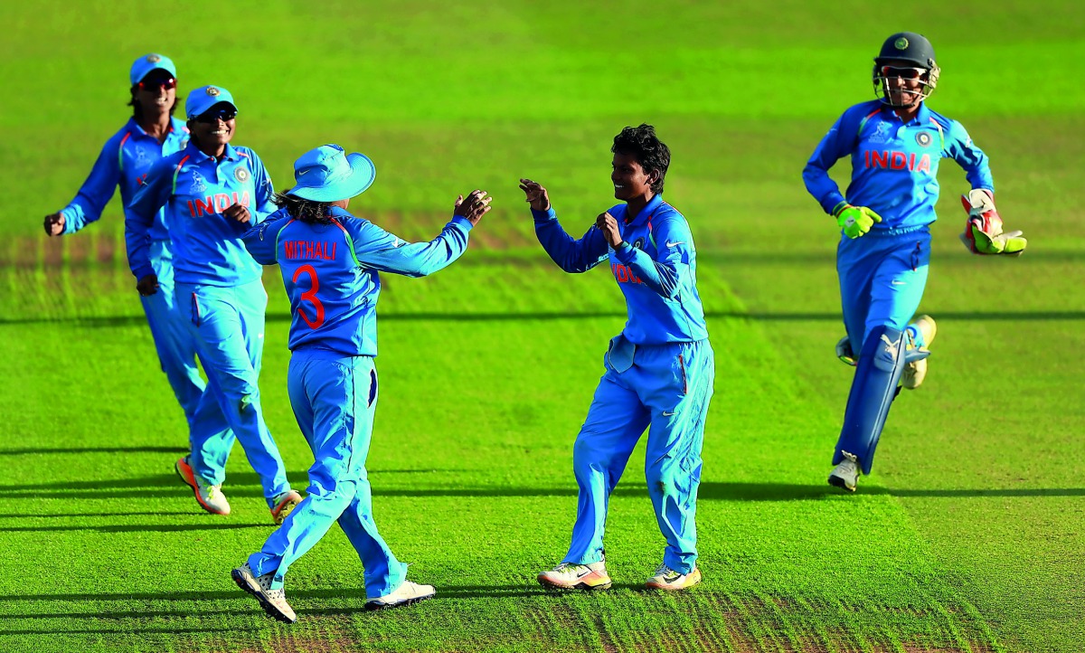Indian players celebrate after taking the wicket of Australia’s Alex Blackwell to win the Women’s World Cup semi-final in Derby, Britain on Thursday. 