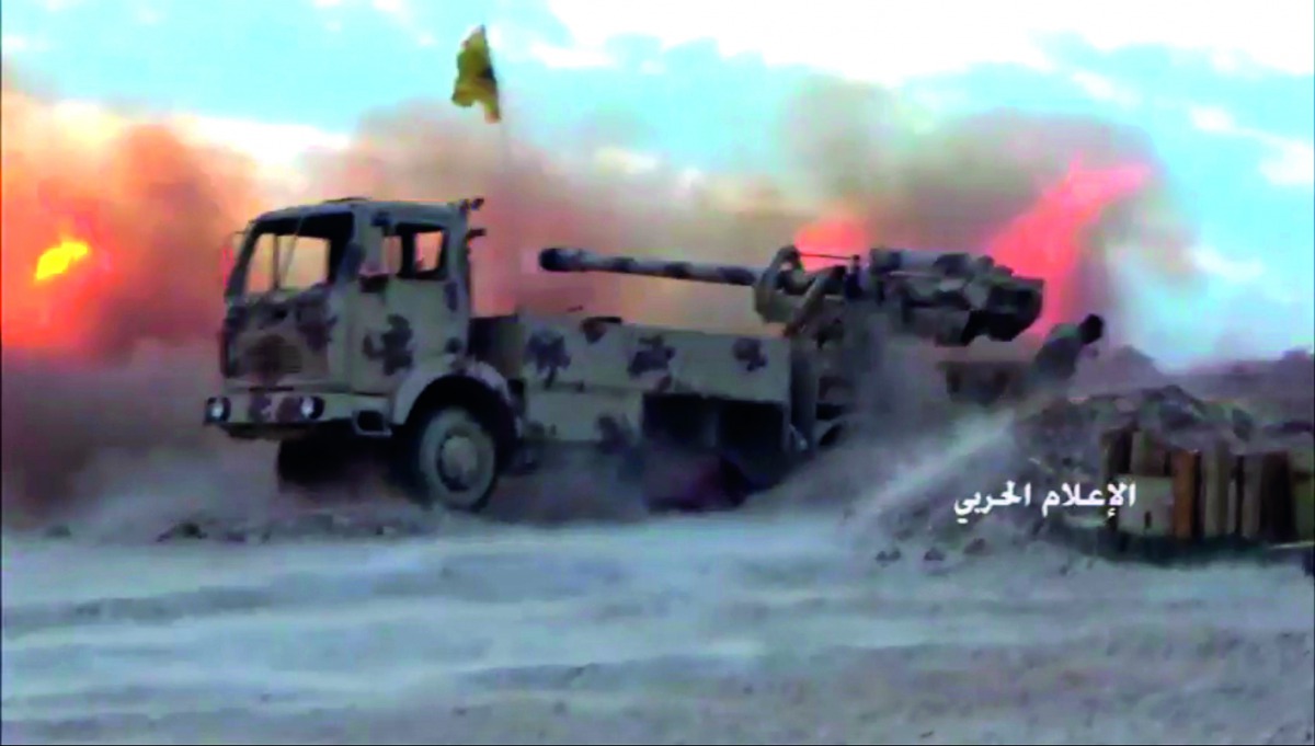 A picture released by the media office of Lebanon's Shiite militant group Hezbollah on July 21, 2017 shows an artillery firing towards militant jihadists' position in Jurud Arsal, a mountainous region bordering with Syria. Lebanon's powerful Hezbollah gro