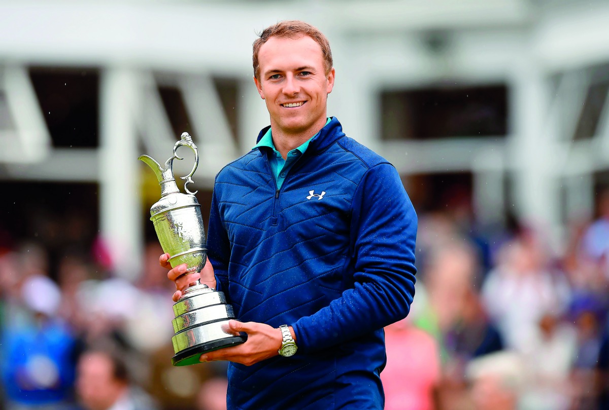 US golfer Jordan Spieth poses for a picture with the Claret Jug, the trophy for the Champion golfer of the year after winning the 2017 British Open Golf Championship at Royal Birkdale golf course near Southport in north west England, yesterday. 