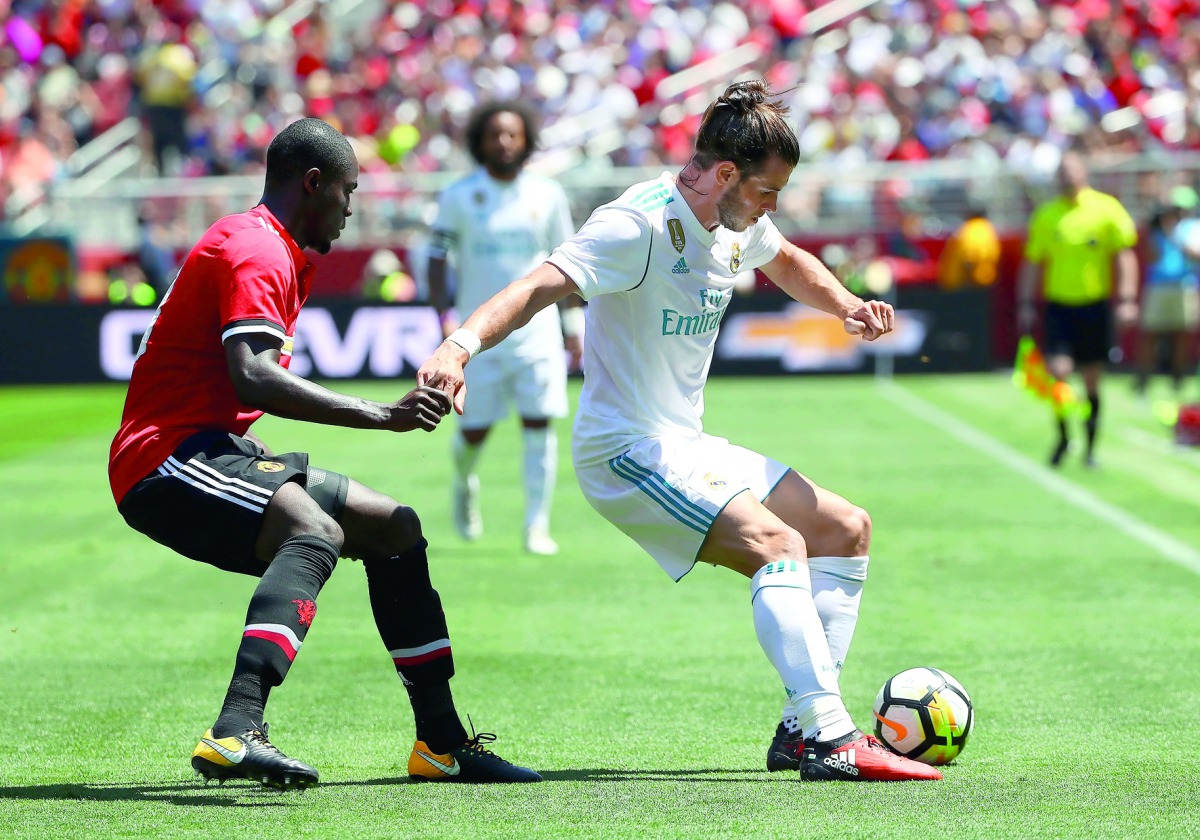 Gareth Bale of Real Madrid controls the ball in front of Eric Bailly of Manchester United during the International Champions Cup match at Levi’s Stadium in Santa Clara, California.