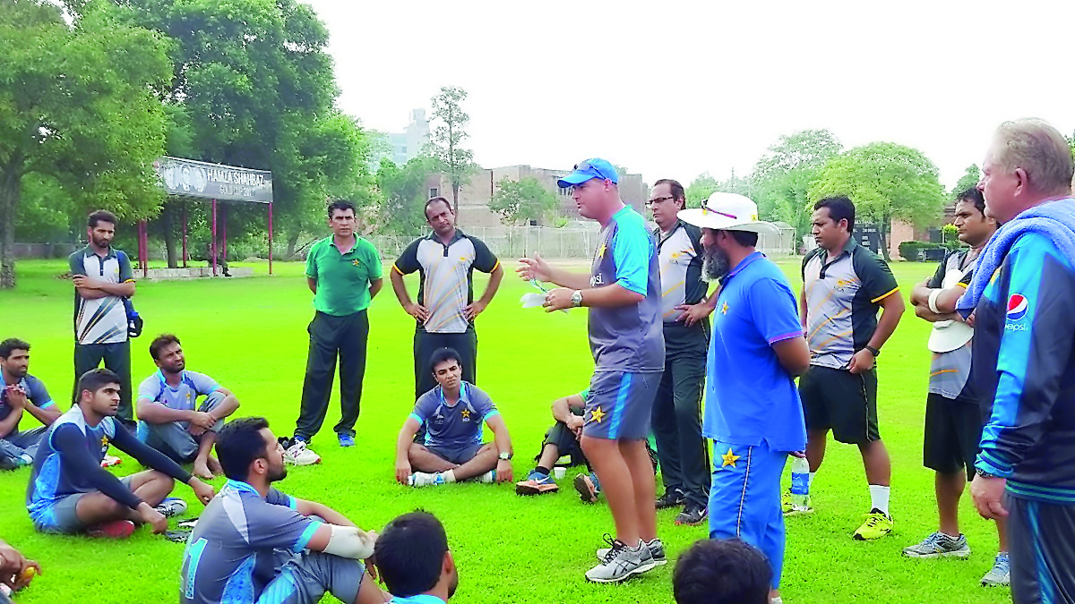 Coach Mickey Arthur (fourth right) gives tips to Pakistani cricketers during a 10-week High Performance Camp at the National Cricket Academy in Lahore. Pakistan coach Mickey Arthur yesterday said he hoped a proposed tour of World XI would bring the South 