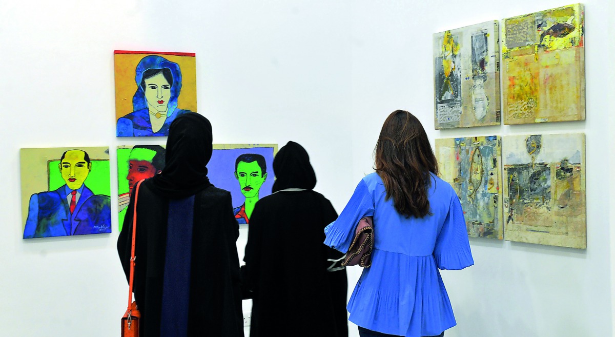 Visitors at the opening of 50x50 exhibition in Al Markhiyah Gallery at Katara Art Center,  yesterday. Pic: Kammutty VP / The Peninsula
