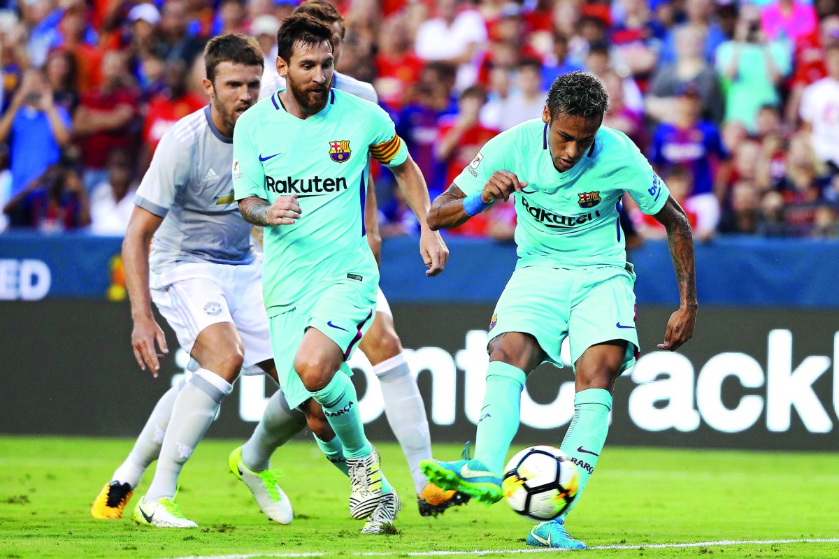 Barcelona’s Neymar scores a goal against Manchester United during their International Champions Cup match at FedExField in Landover, Maryland, USA on Wednesday.