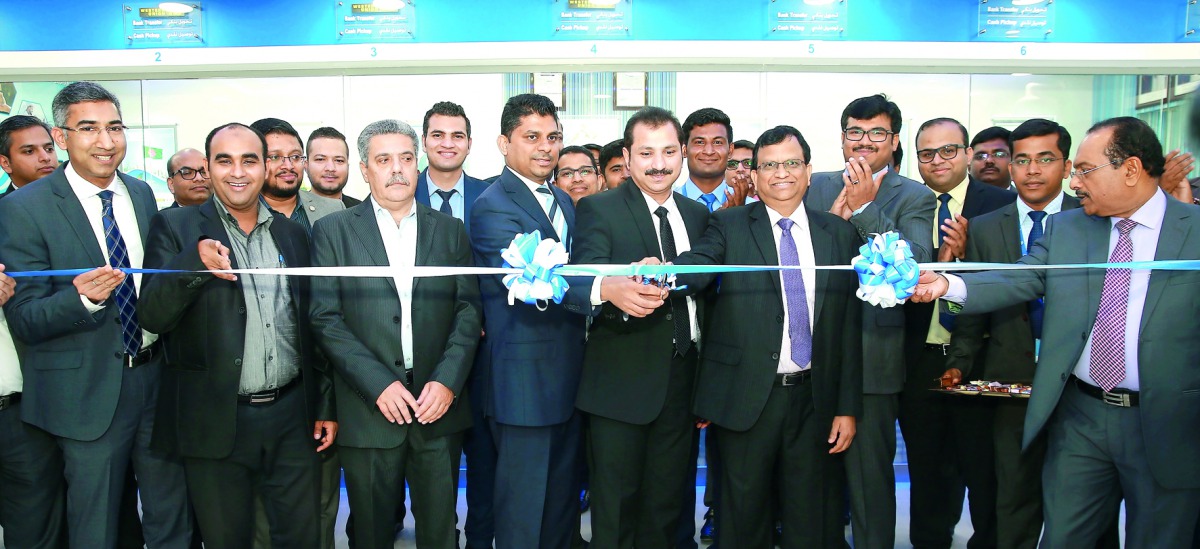 The officials, customers and well-wishers of the Trust Exchange Company WLL during the inauguration of its new branch at New Quality Hypermarket in Bin Mahmoud. 