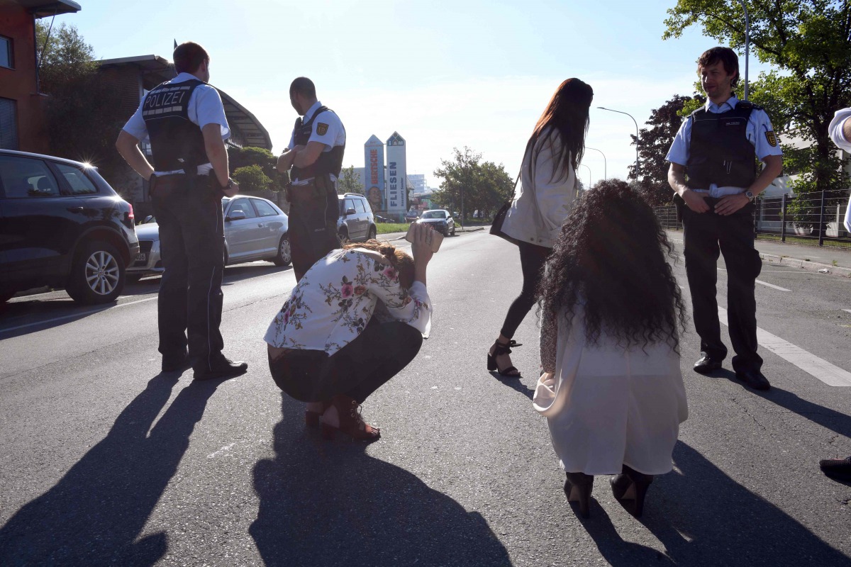 Police stand near the disco Club Grey in the southern German town of Konstanz, where a gunman opened fire, killing one and wounding four people before being shot by police, on July 30, 2017. (AFP / dpa / Felix K?stle)