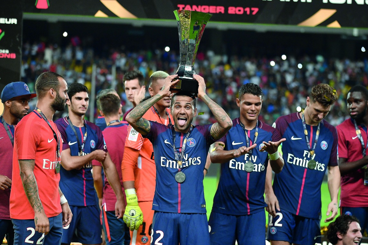 Dani Alves of PSG celebrates after his side beat Monaco at the Grand Stade in Tangiers.
