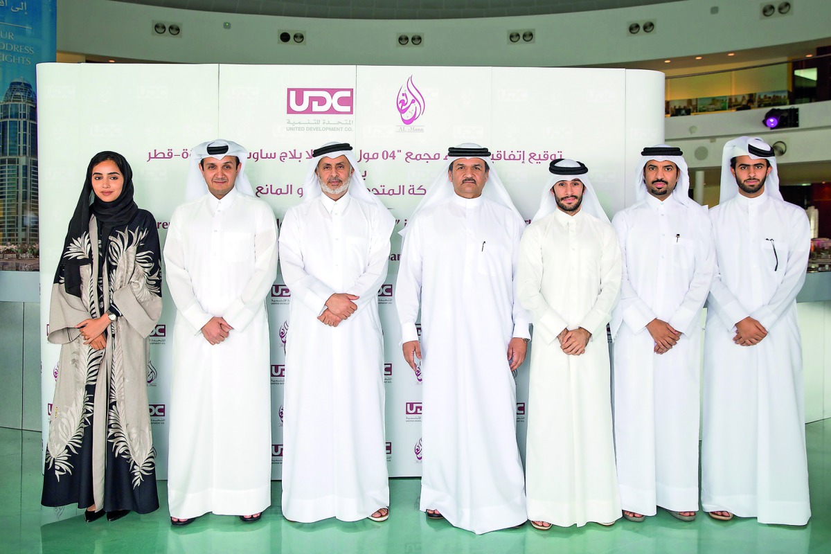 UDC Chairman Turki bin Mohammed Al Khater (third left), the President and CEO  Ibrahim Jassim Al Othman (centre),  Abdulaziz Mohammed Hamad Al Mana (second left), CEO of Mohammed Al Hamad Al Mana Group; Hussain Al Baker (third right) and other officials a