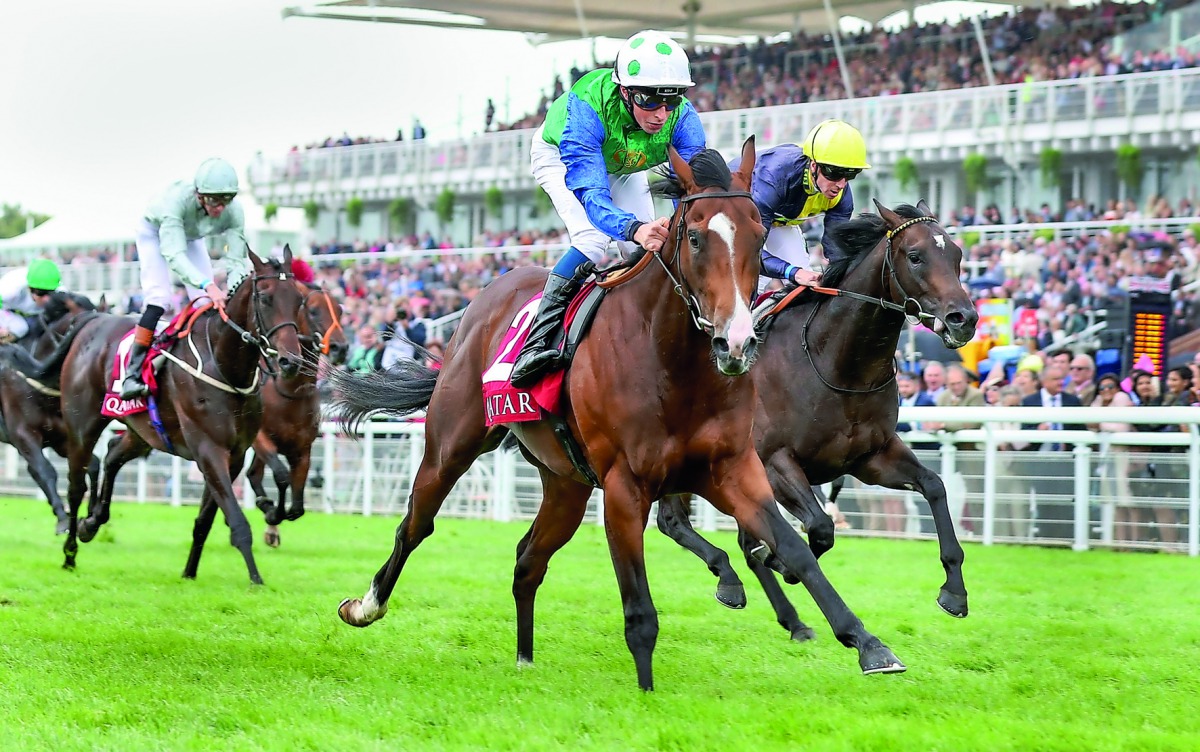 Jockey W Buick astride Barraquero (centre) extends lead on his way to win the Qatar Richmond Stakes (Group 2) event at the Qatar Goodwood Festival in West Sussex, England yesterday.