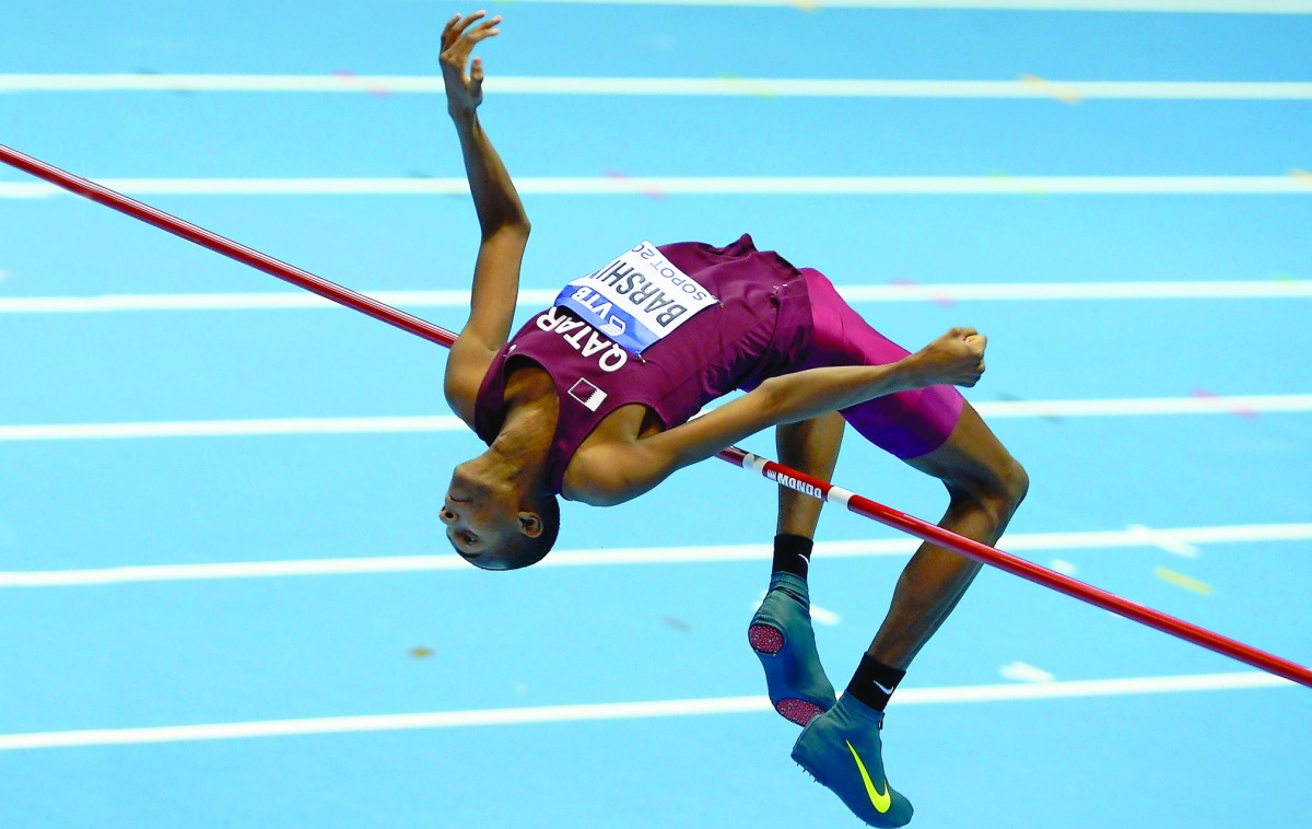 Qatari star  athlete Mutaz  Essa Barshim  competes in the men’s high jump at the World Indoor Athletics championships in Sopot, Poland in this file photo.