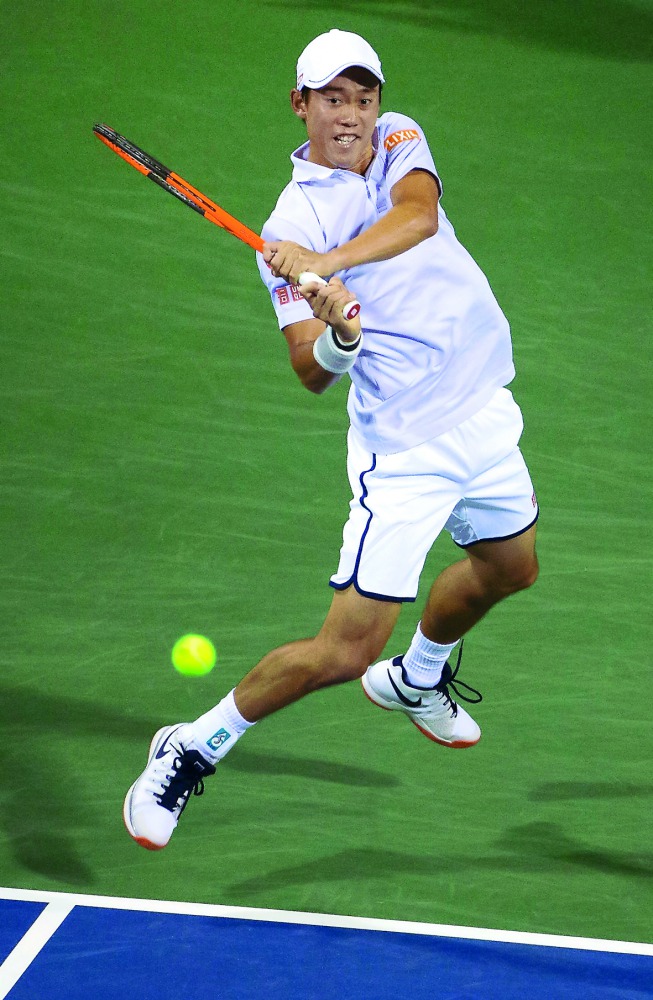 Kei Nishikori of Japan competes with Tommy Paul of USA at William HG FitzGerald Tennis Center in Washington, DC. Nishikori won 3-6, 7-6 (10/8), 6-4.