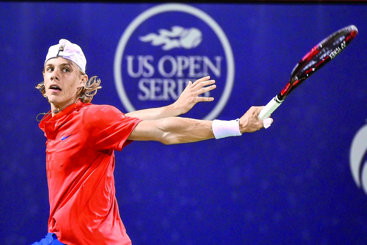 Denis Shapovalov of Canada hits a return against Rafael Nadal of Spain during the Rogers Cup in Montreal on Thursday. The 18-year-old beat top seed Nadal 3-6, 6-4, 7-6(4). 