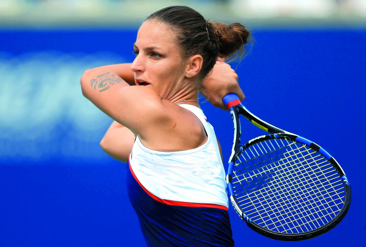 Karolina Pliskova of Czech Republic plays a shot against Naomi Osaka of Japan during the Rogers Cup at Aviva Centre in Toronto, Canada yesterday.