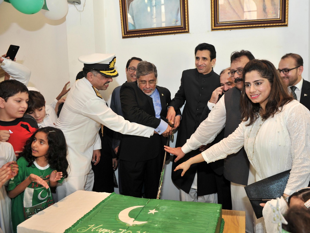 The Ambassador along with other officials cutting a cake during the event. Pic: Baher Amin / The Peninsula