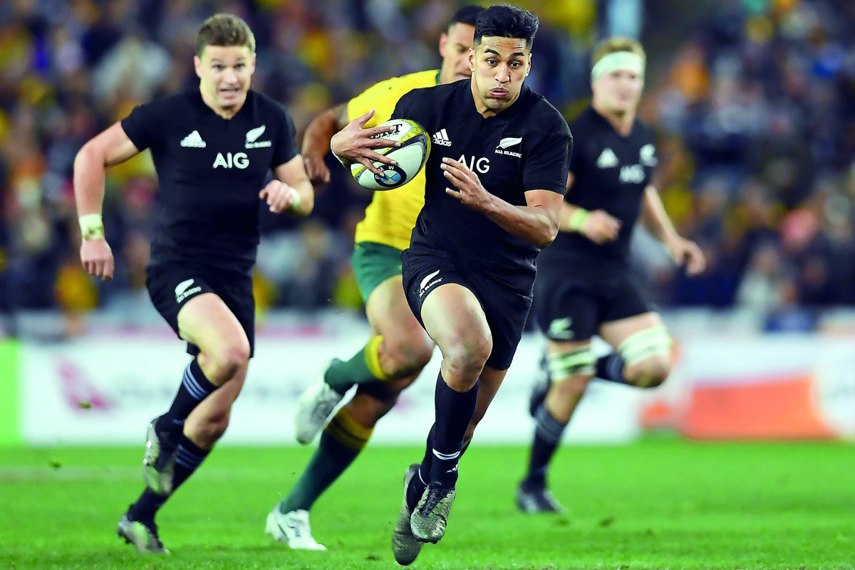 New Zealand’s wing Rieko Ioane scores a try during the Rugby Championship test match against Australia in Sydney, yesterday. 