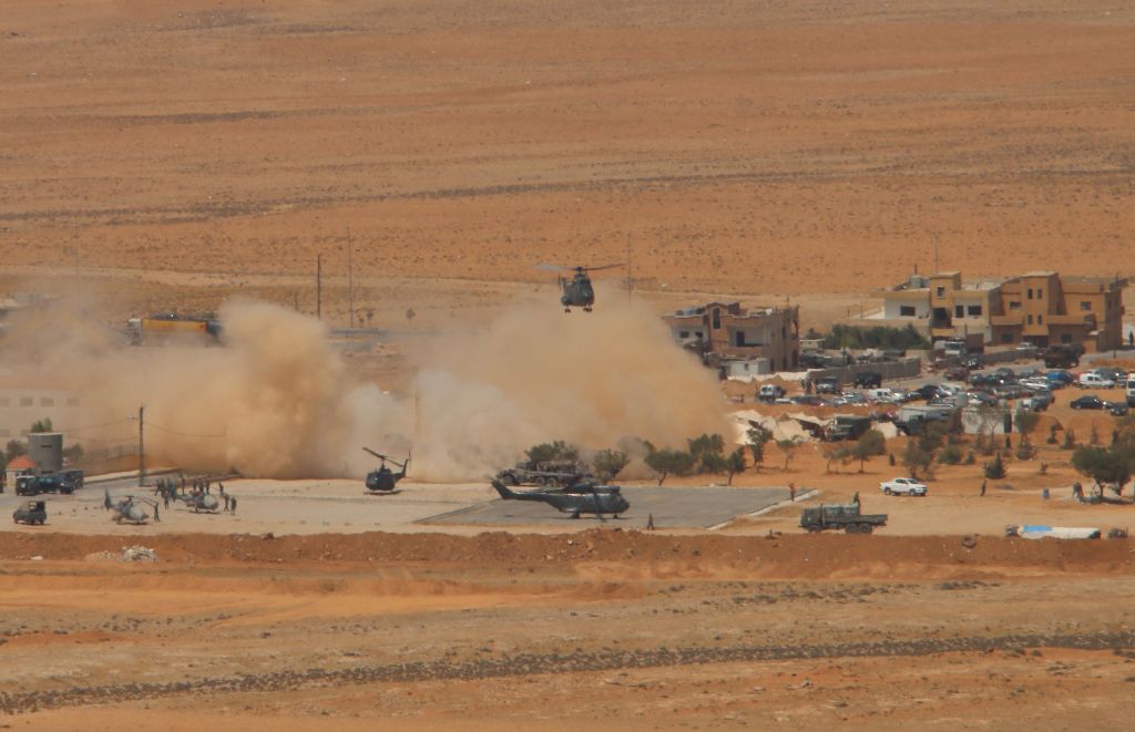 A general view taken on August 20, 2017, shows a military helicopter landing at a Lebanese military base in a mountainous area near the eastern town of Ras Baalbek, as Lebanese troops launched an offensive against the Islamic State group on the country's 