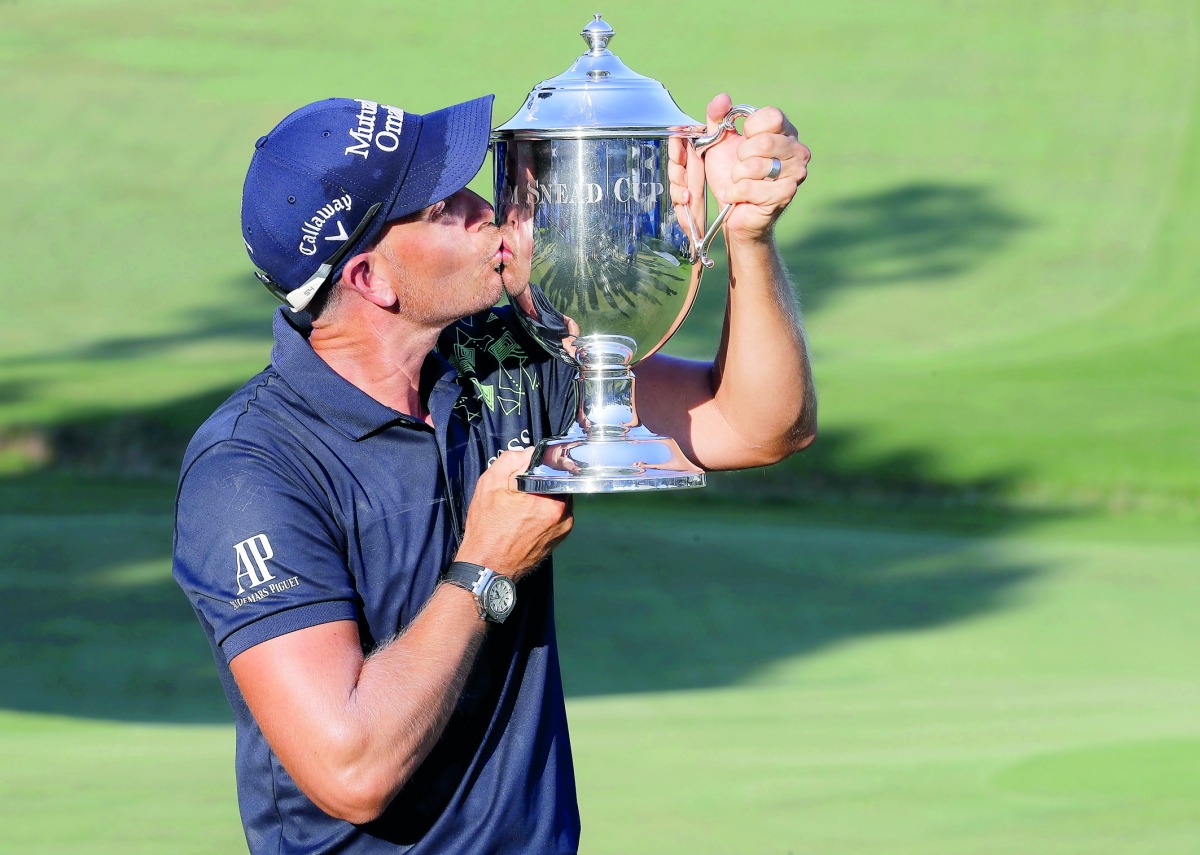 Henrik Stenson poses with the trophy after winning the Wyndham Championship at Sedgefield Country Club in Greensboro, North Carolina on Sunday.