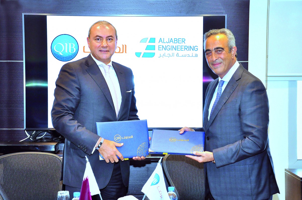 Bassel Gamal (left) QIB’s Group CEO and Osama Hadid CEO of JEC at the agreement signing ceremony at QIB’s headquarters.