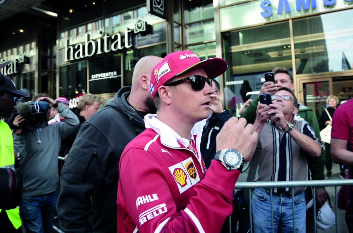 Finnish Formula One driver Kimi Raikkonen of Ferrari arrives at a media meeting of his sponsor Santander Bank in Helsinki, Finland yesterday.