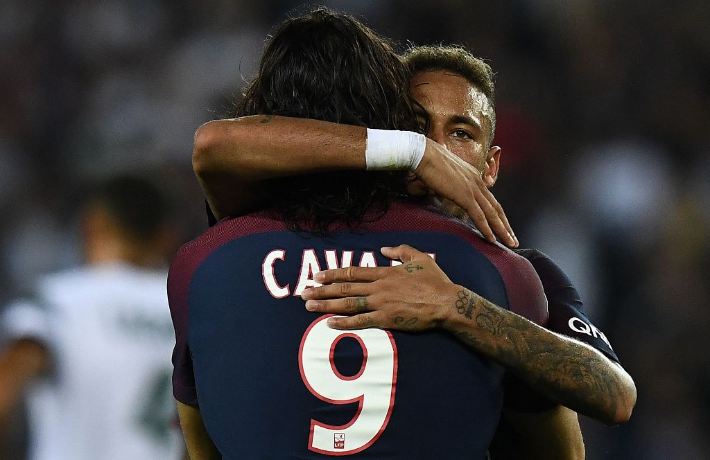 Paris Saint-Germain's Uruguayan forward Edinson Cavani (L) celebrates with Paris Saint-Germain's Brazilian forward Neymar after his second goal during the French L1 football match between Paris Saint-Germain (PSG) and Saint-Etienne (ASSE) on August 25, 20