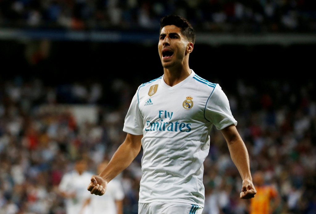 Real Madrid’s Marco Asensio celebrates scoring their first goal REUTERS/Javier Barbancho 