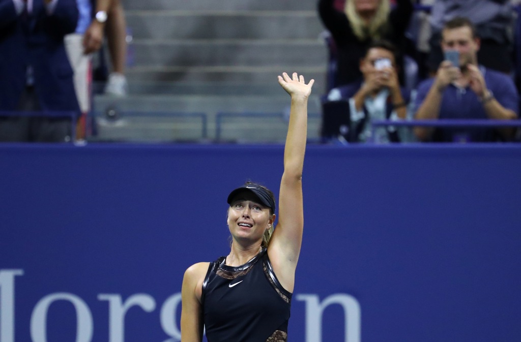 Maria Sharapova of Russia greets the crowd after winning against Simona Halep (not seen) of Romania Women's Singles within 2017 US Open Tennis Championships at Arthur Ashe Stadium in New York, United States on August 28, 2017. ( Volkan Furuncu - Anadolu A
