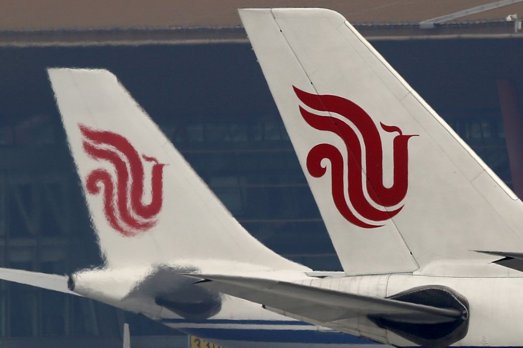 Flights of Air China are parked on the tarmac of Beijing Capital International Airport in Beijing, China, March 28, 2016.REUTERS/Kim Kyung-Hoon/File Photo 