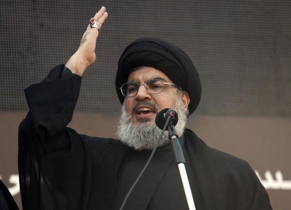 Lebanon Hezbollah leader Sayyed Hassan Nasrallah during an Ashura procession in Beirut suburb, November 14, 2013 (Reuters / Khalil Hassan) 
