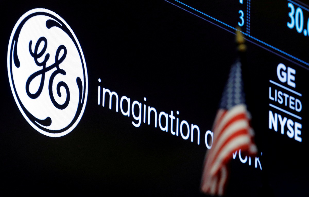 The ticker and logo for General Electric Co. is displayed on a screen at the post where it is traded on the floor of the New York Stock Exchange (NYSE) in New York City, U.S. on June 30, 2016. Reuters/Brendan McDermid