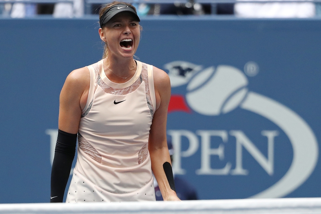 Maria Sharapova of Russia reacts after winning a point against Anastasija Sevastova of Latvia (not pictured) on day seven of the U.S. Open tennis tournament at USTA Billie Jean King National Tennis Center. Mandatory Credit: Geoff Burke-USA TODAY Sports
