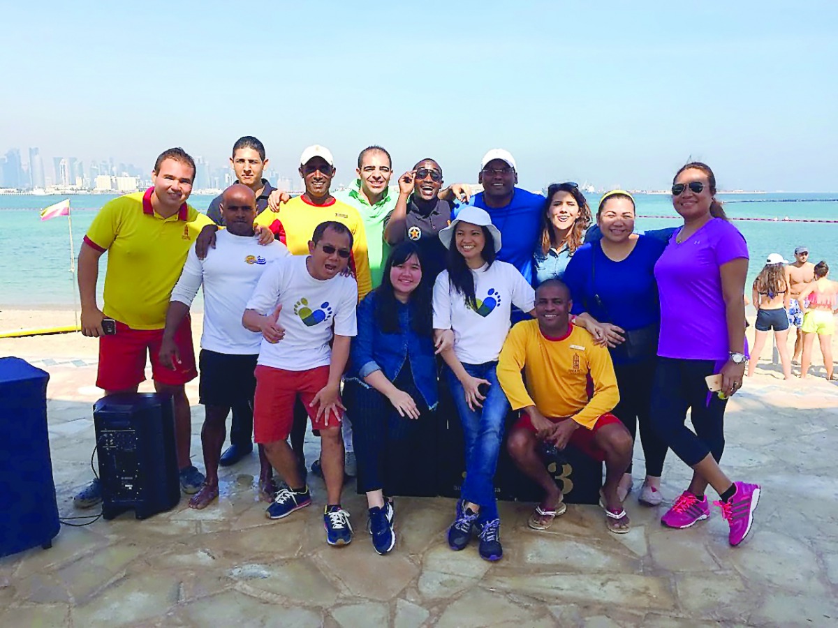 A file picture of the ‘Swim for a Cause’ event held last year at the Sharq Village & Spa beach last year.