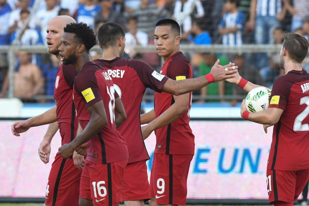 USA's Bobby Wood (2-R) celebrates with teammates Michael Bradley (L), Kellyn Acosta (2-L), Clint Dempsey (3-L) and Paul Arriola (R) after scoring against Honduras during their 2018 World Cup football qualifier match in San Pedro Sula, Honduras, on Septemb