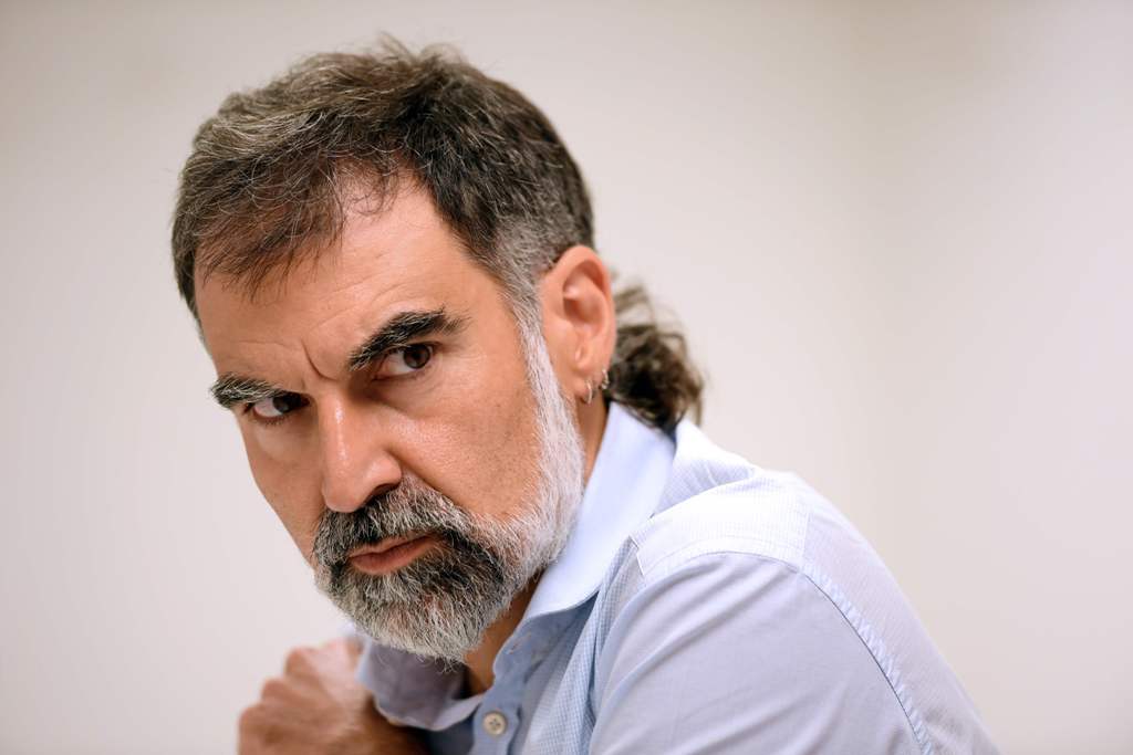Omnium Cultural's president, Jordi Cuixart, gestures during a press conference in Madrid on September 5, 2017, to support the self determination referendum organized by the Catalonia's government for next October 1, in Barcelona. / AFP / GABRIEL BOUYS
