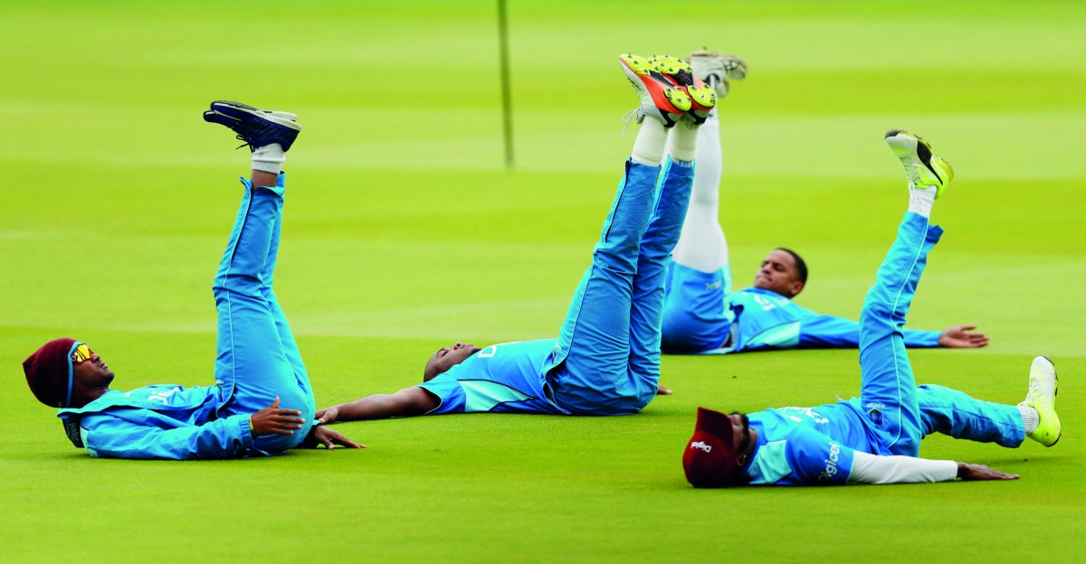West Indies’ Kraigg Brathwaite (left) takes part in a training session at Lord’s cricket ground in London, yesterday, ahead of the third Test match against England which starts today.