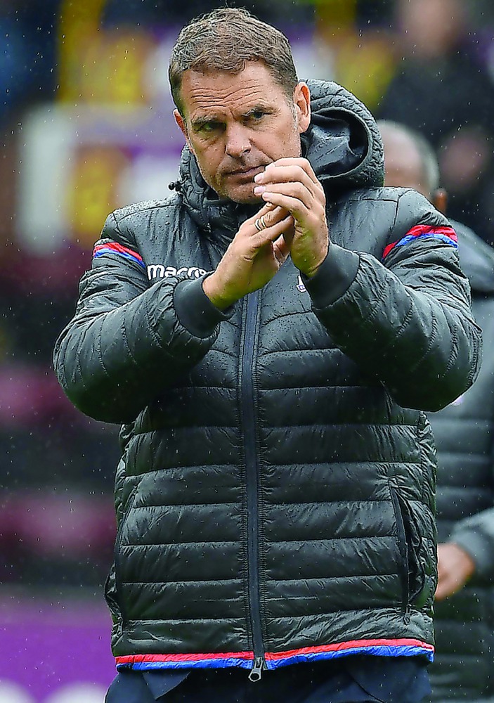 Crystal Palace’s Dutch manager Frank de Boer applauding the fans at full-time of the English Premier League match against Burnley at Turf Moor in Burnley, northwest England, on Sunday.