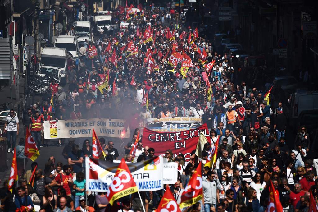 Demonstrators take part in a protest called by several French unions against the labour law reform in Marseille, southern France, on September 12, 2017.   AFP / ANNE-CHRISTINE POUJOULAT
