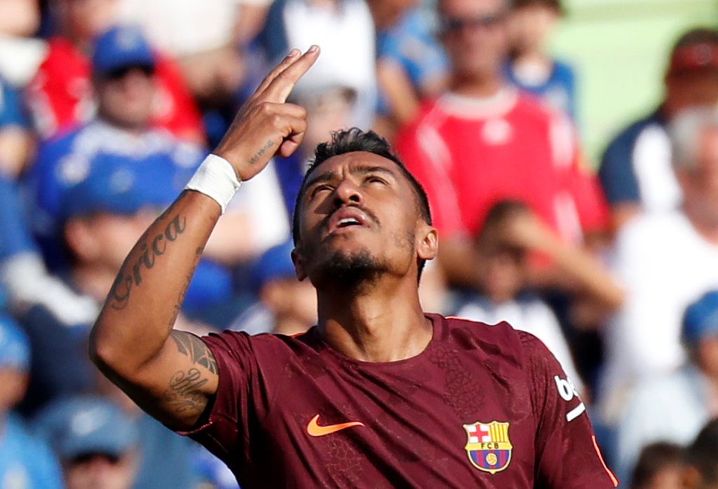 Barcelona's Paulinho celebrates scoring their second goal. (REUTERS/Paul Hanna)