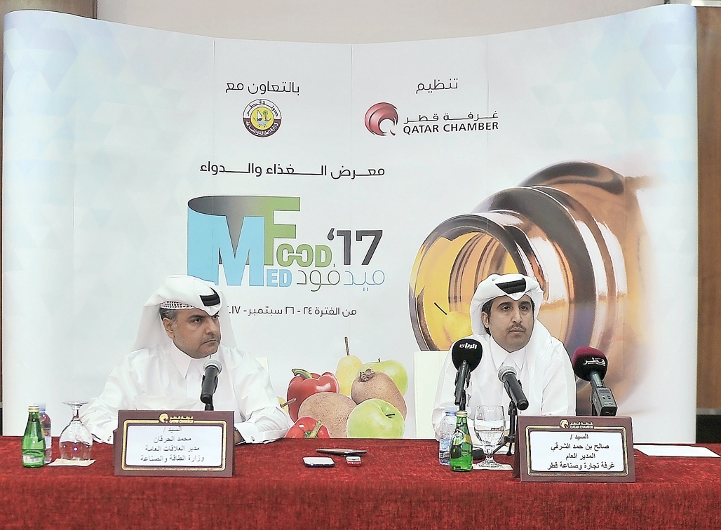 Mohamad Al Harqan (left), Public Relation Manager at Ministry of Energy and Industry and Saleh bin Hamad Al Sharqi, Director General of Qatar Chamber announcing the Medfood 2017 expo dates, at Qatar Chamber headquarters.