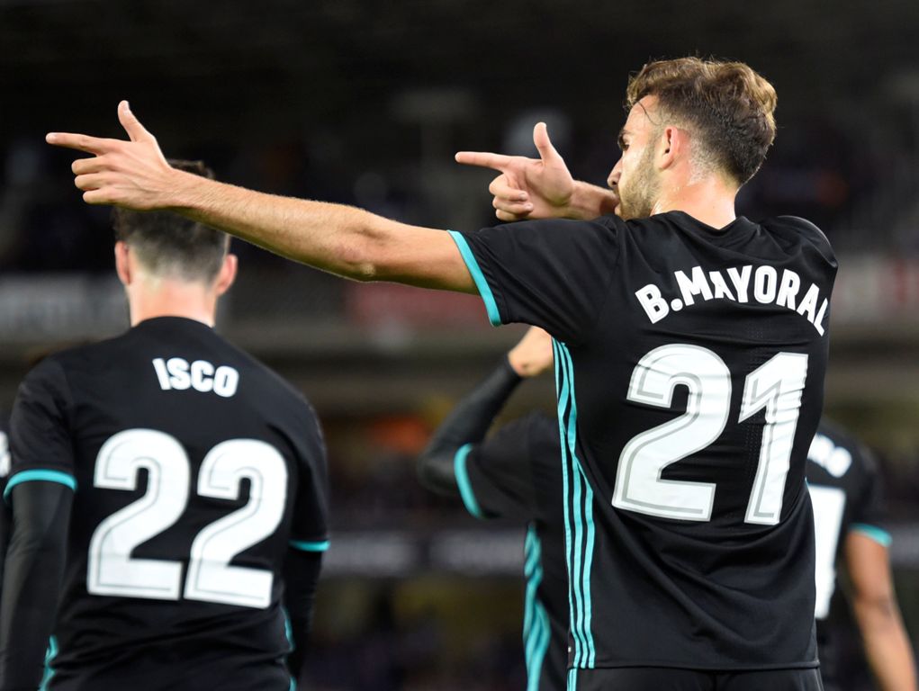 Real Madrid's forward from Spain Borja Mayoral celebrates after scoring his team's first goal during the Spanish league football match Real Sociedad vs Real Madrid CF at the Anoeta stadium in San Sebastian on September 17, 2017. / AFP / ANDER GILLENEA
