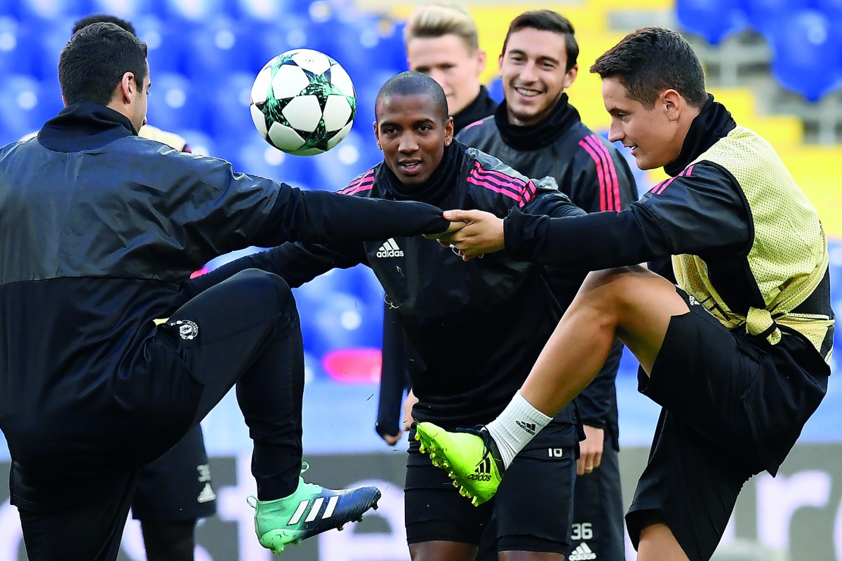 Manchester United’s midfielders Henrikh Mkhitaryan,  Ashley Young and Ander Herrera take part in a training session at the Stadion CSKA Moskva in Moscow yesterday on the eve of the UEFA Champions League Group A football match against PFC CSKA Moskva.