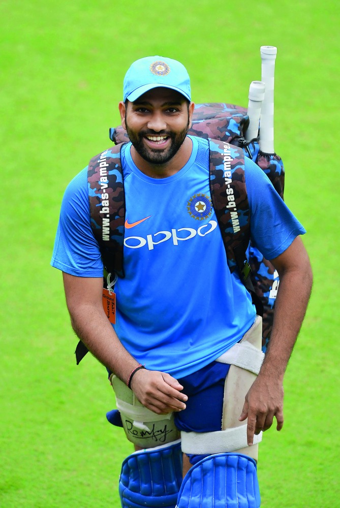 Indian cricketer Rohit Sharma returns after a net practice session on  the eve of the fourth one-day international (ODI) match in the ongoing India-Australia cricket series at the M Chinnaswamy Stadium in Bangalore.