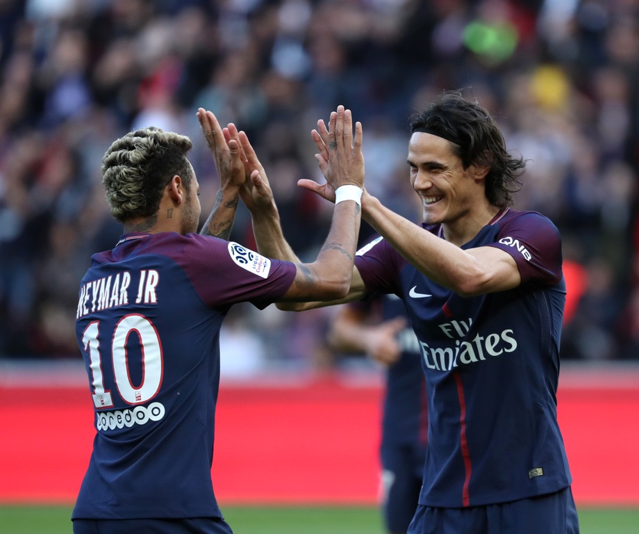 Edinson Cavani (R) of Paris Saint-Germain celebrates his score with Neymar (L) during the French Ligue 1 football match between Paris Saint-Germain (PSG) and Bordeaux at the Parc des Princes Stadium in Paris, France on September 30, 2017. ( Mustafa Yalç?n