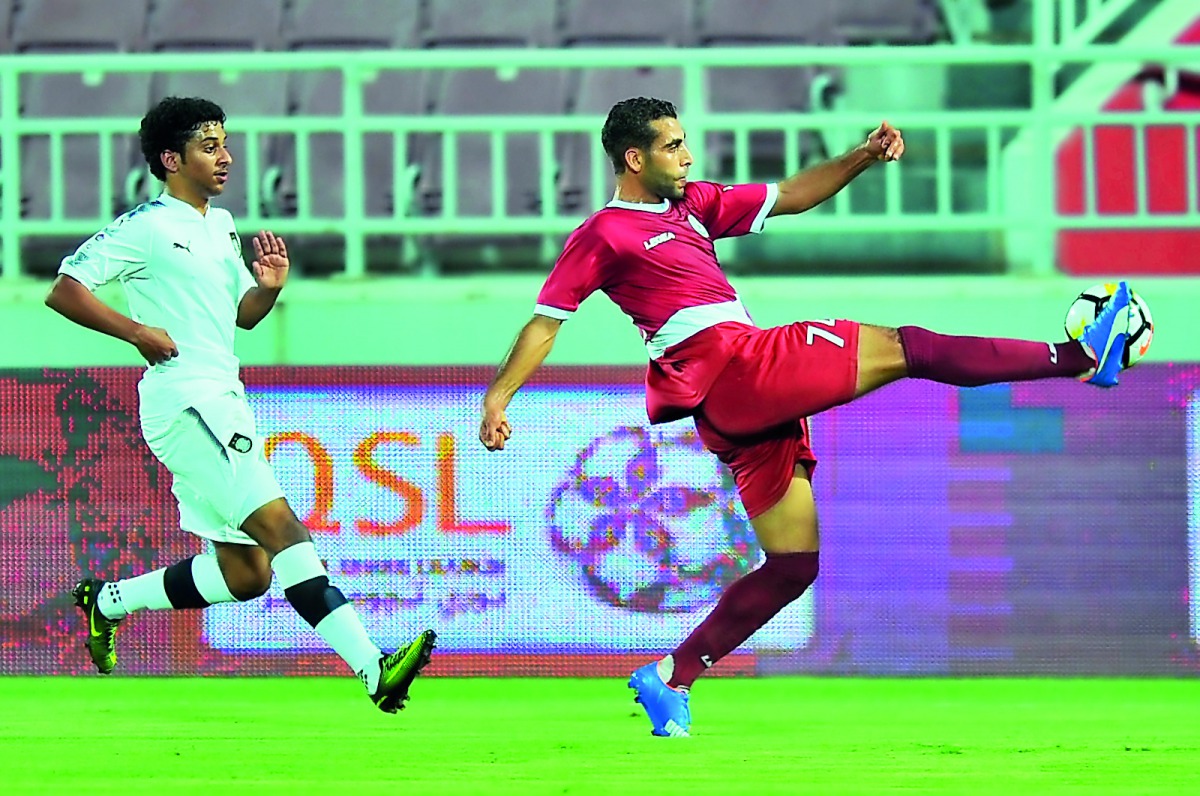 Mahmoud Mohamed of Al Markhiya aims a shot at Al Sadd goal during their QSL Cup match at Al Duhail Stadium yesterday. 