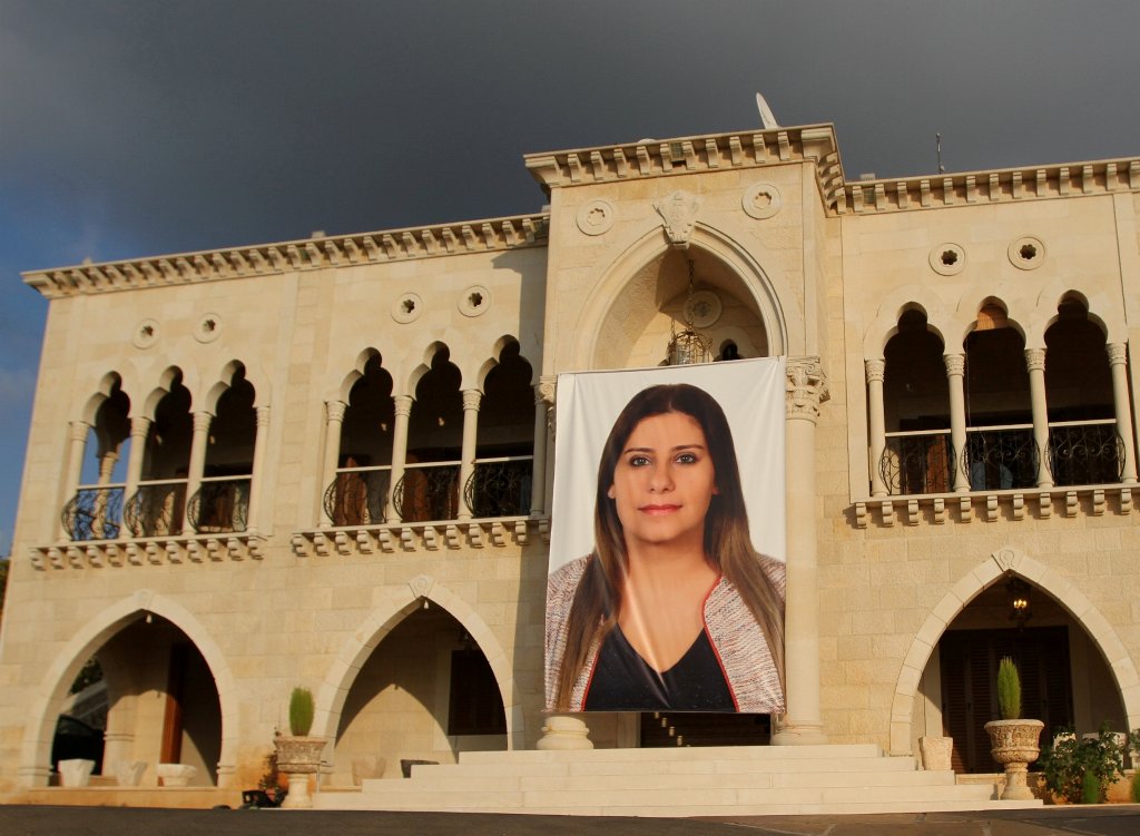 A picture of Rayya Chidiac hangs on her family's home in the village of Miziara, northern Lebanon, September 29, 2017. Picture taken September 29, 2017. REUTERS/ Omar Ibrahim
