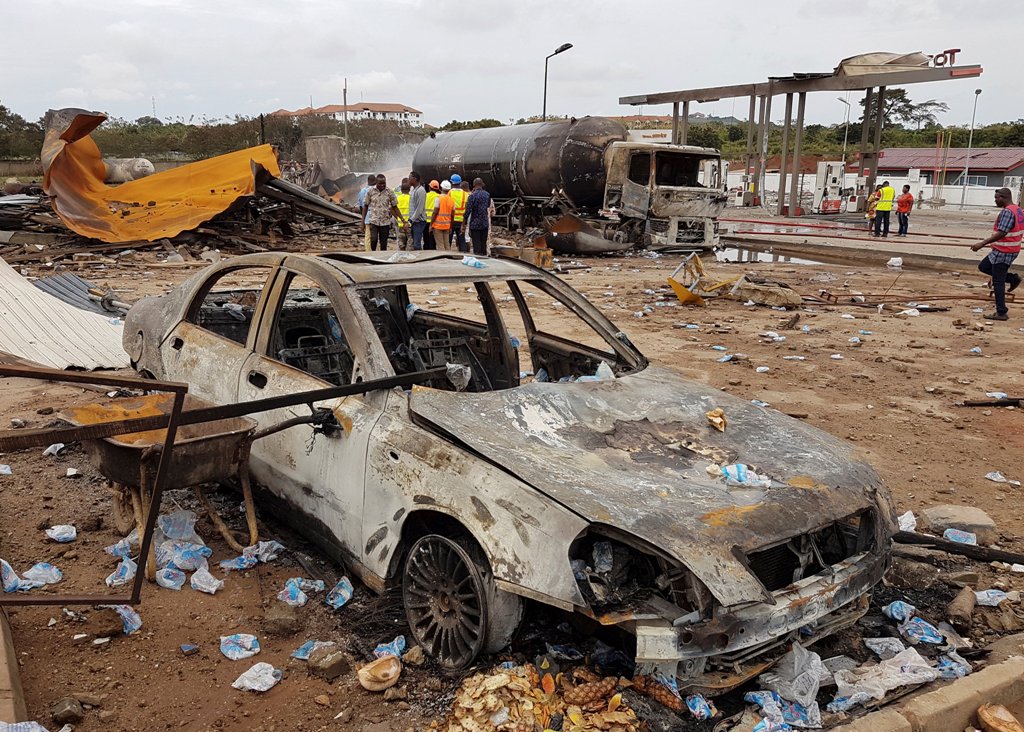 Burnt vehicles are pictured at the site of an explosion at a gas depot in Accra, Ghana October 8, 2017. REUTERS/Kwasi Kpodo
