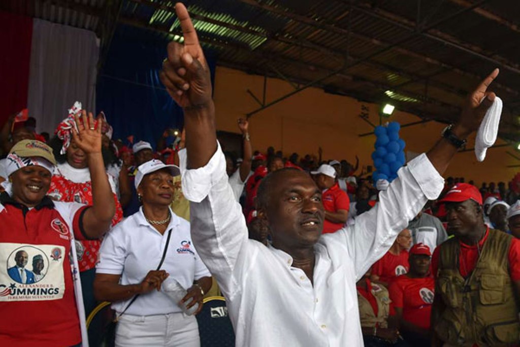Liberian presidential candidate Alexander Cummings waves to supporters during a campaign rally in Monrovia, two days ahead of the country’s elections. PHOTO | ISSOUF SANOGO | AFP.