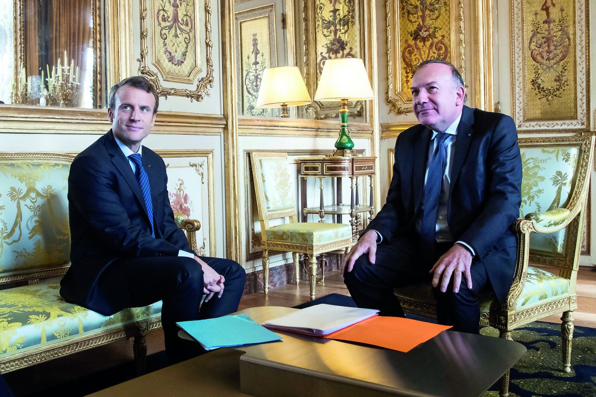 French President Emmanuel Macron (left) attends a meeting with French employer’s body MEDEF union leader Pierre Gattaz at the Elysee Palace in Paris, France, yesterday