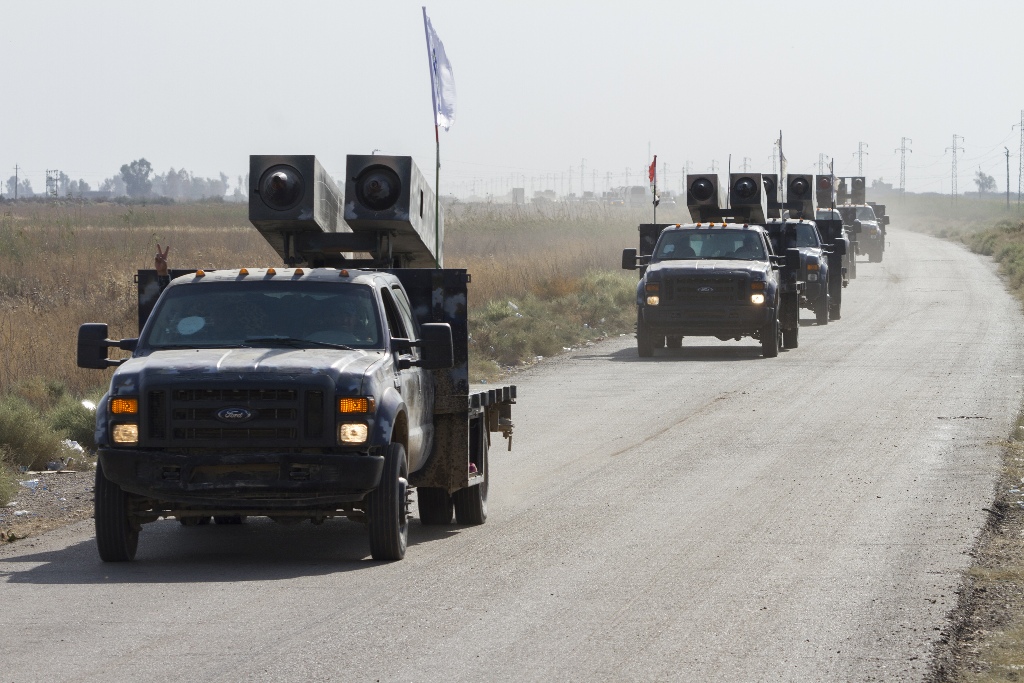 Iraqi security forces' armoured vehicles are deployed to meters away from the Peshmerga site in Kirkuk, Iraq on October 14, 2017.  Hassan Ghaedi - AA